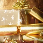 presents wrapped in shiny gold wrapping paper