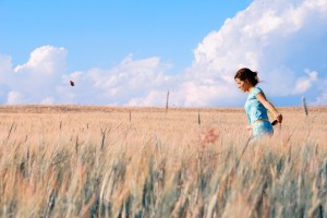 Girl Chasing Butterfly
