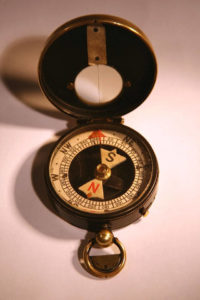 close up of open compass