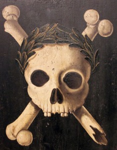 painting of skull and crossbones with civic crown of leaves