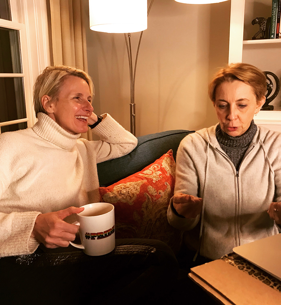 Elizabeth Gilbert with a cup of coffee talking with Martha Beck