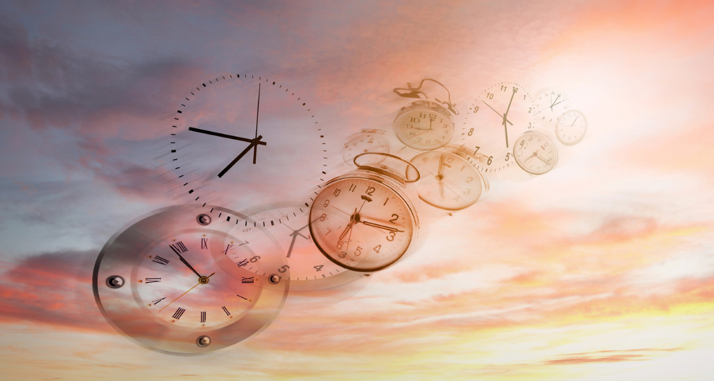 Clocks floating away in a sunset sky
